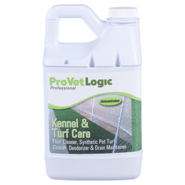 A white jug has a green label on it with an image of turf. The label reads "ProVetLogic Kennel & Turf Care".
