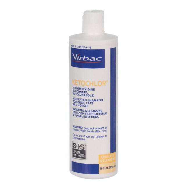 A white bottle has blue, yellow, & red labeling. It says "Virbac Ketochlor" shampoo for dogs.