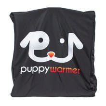 A black puppy warmer cover has a white & red logo of a puppy's face. Underneath the logo reads "puppy warmer".